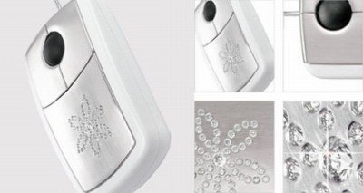 USB mouse covered with white gold